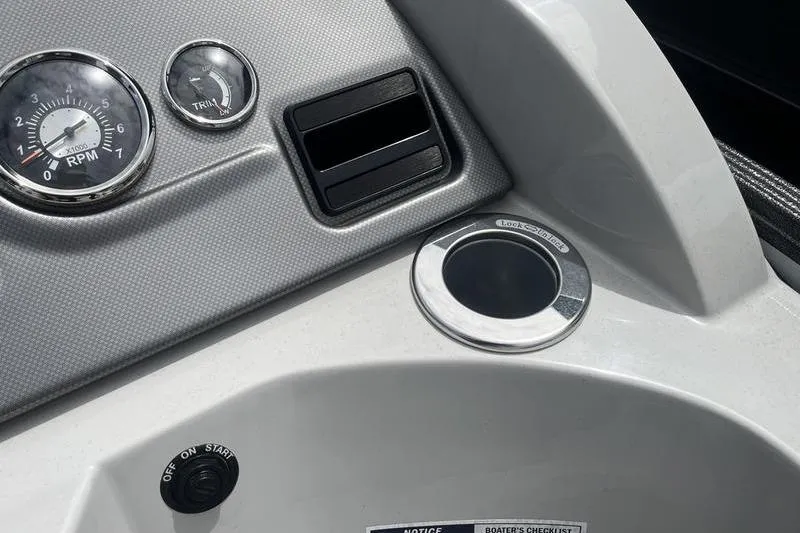 Slide: The Image of Dashboard of 2024 Crest Classic 220 boat with RPM gauge and controls. - 12