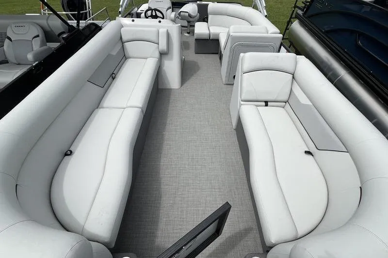Slide: The Image of 2024 Crest Classic 220 pontoon boat interior with spacious seating and modern design. - 4