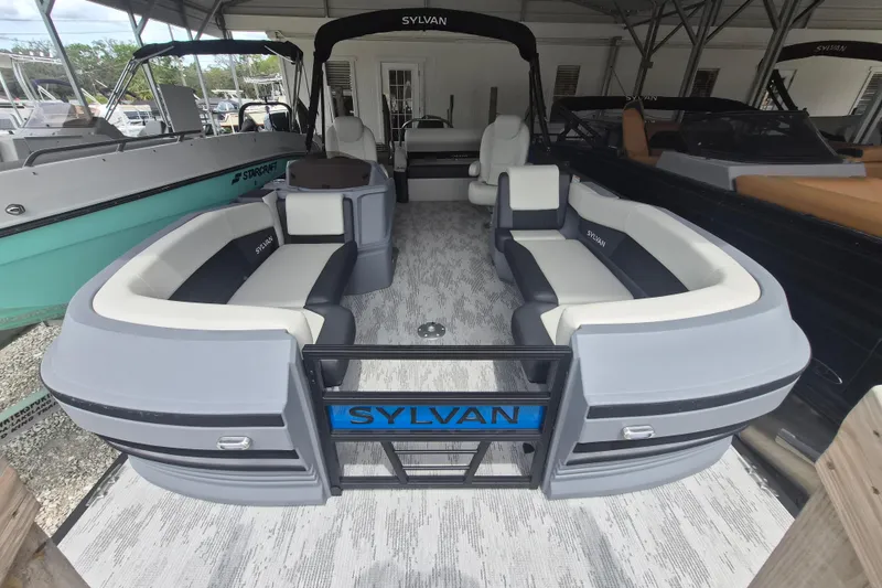 The Image of 2026 Sylvan R-22 LZ DH pontoon boat with spacious seating and modern design. - 1