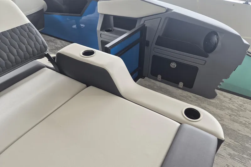Slide: The Image of Interior of 2026 Sylvan R-22 LZ DH boat with comfortable seating and cup holders. - 13