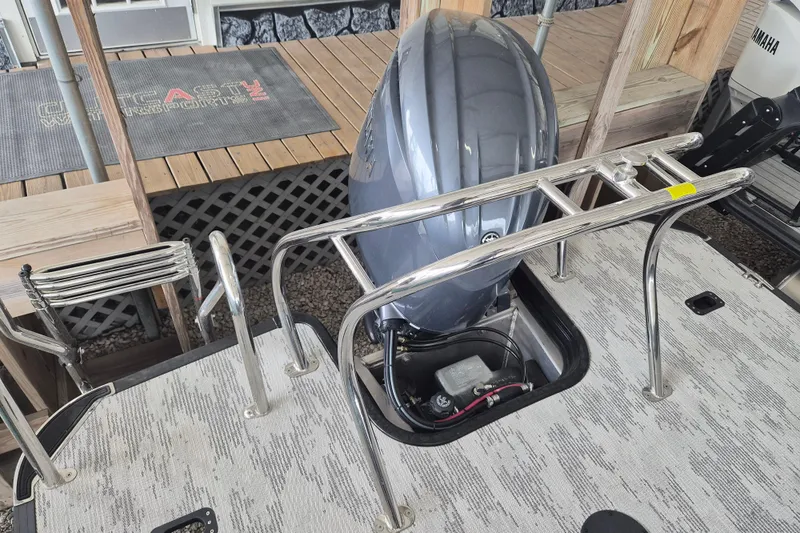 Slide: The Image of 2026 Sylvan R-22 LZ DH boat with Yamaha outboard motor and stainless steel railing. - 14