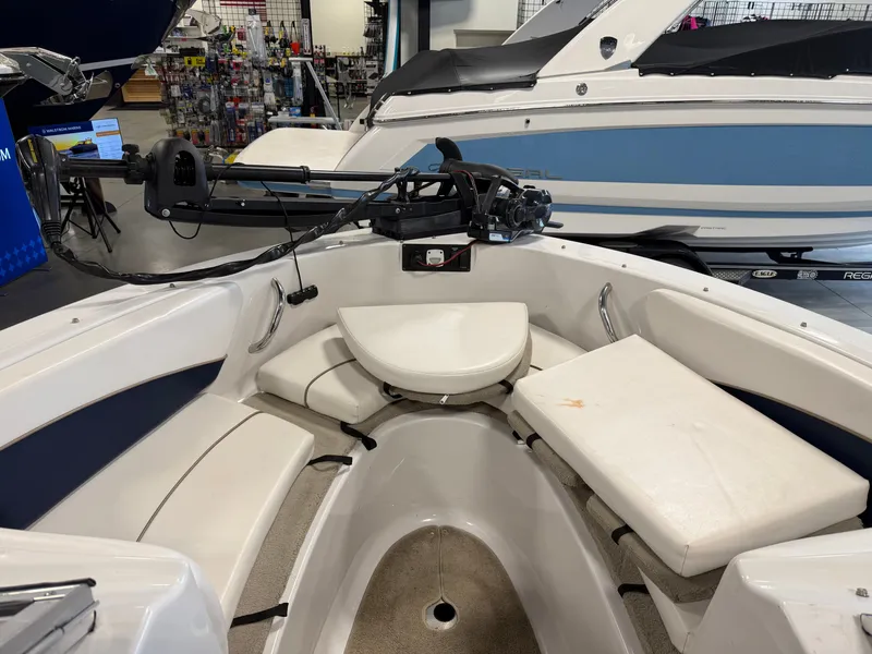 Slide: The Image of Interior view of a 2010 Four Winns H190 F/S boat with seating area. - 11