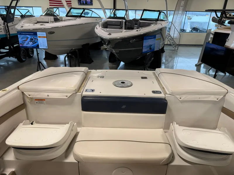 Slide: The Image of Interior view of a 2010 Four Winns H190 F/S boat in showroom. - 20