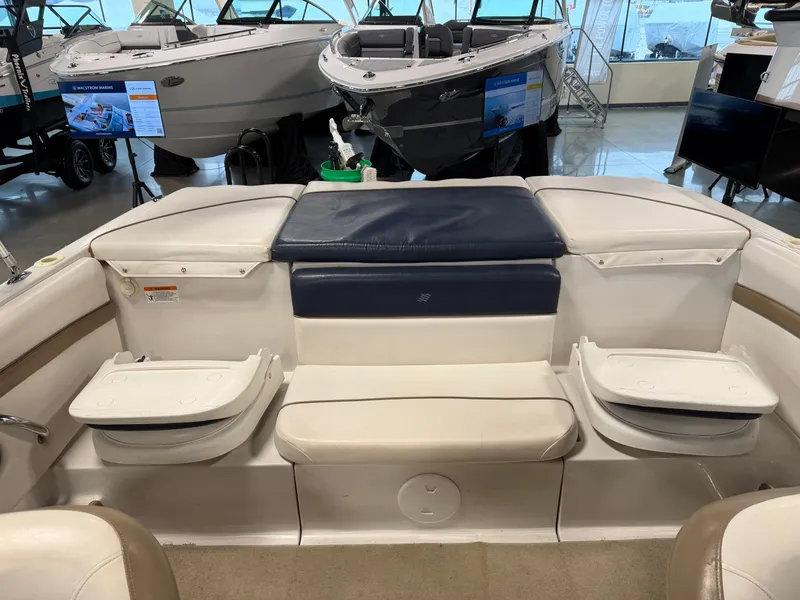 Slide: The Image of Interior of a 2010 Four Winns H190 F/S boat in showroom. - 21