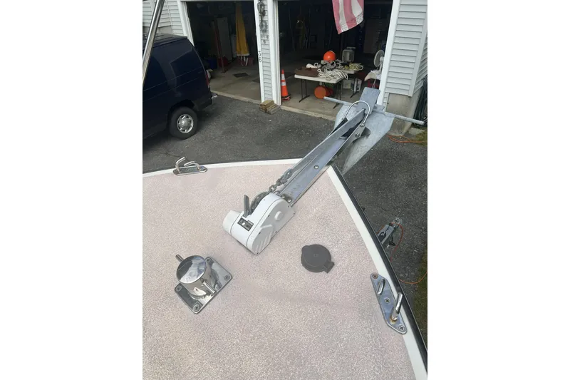 Slide: The Image of 1998 General Marine Custom Downeast boat anchor system on deck, garage background. - 13