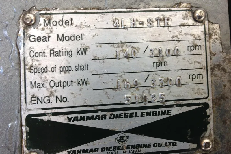 Slide: The Image of Yanmar diesel engine plate with specifications for General Marine Custom Downeast, 1998 model. - 25