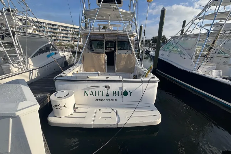 Slide: The Image of 2008 Tiara Yachts 3200 Open docked at marina, Orange Beach, AL. - 3