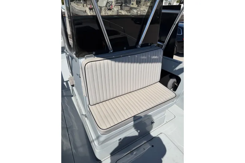 Slide: The Image of 2020 Strike 26' Center Console Cuddy boat with cushioned seating. - 10