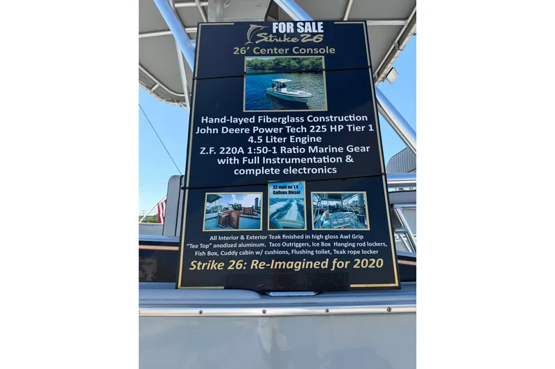 Slide: The Image of For sale sign for 2020 Strike 26' Center Console Cuddy boat with detailed specifications. - 20