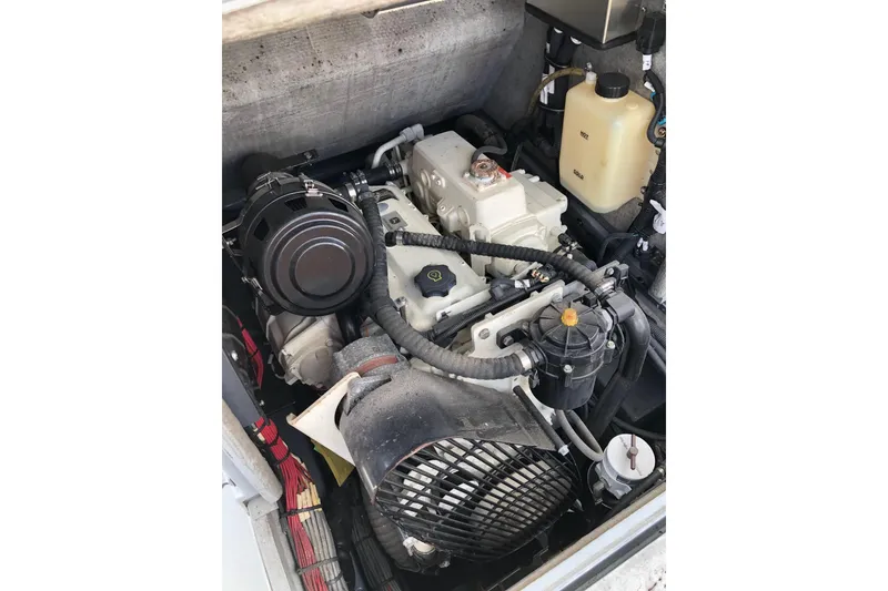 Slide: The Image of Engine compartment of a 2020 Strike 26' Center Console Cuddy boat. - 22