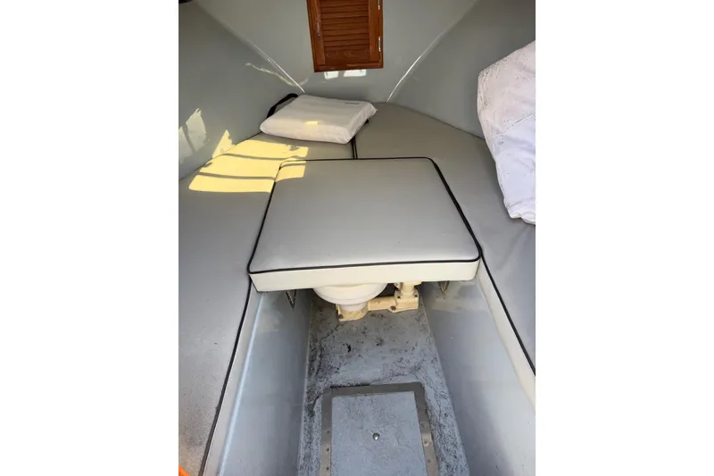 Slide: The Image of Interior of 2020 Strike 26' Center Console Cuddy with cushioned seating and storage. - 3