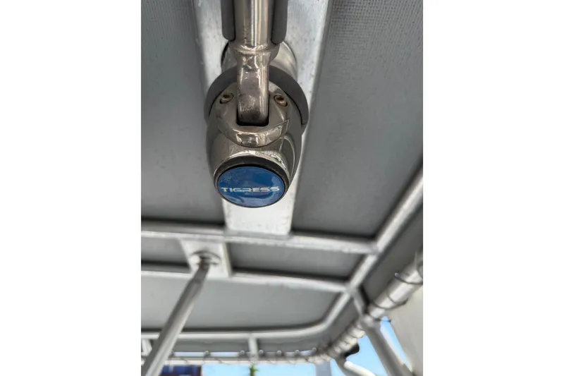 Slide: The Image of Tigress rod holder on 2020 Strike 26' Center Console Cuddy boat. - 5