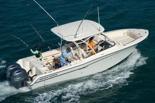 Slide: The Image of Manufacturer Provided Image: 2017 Grady-White Freedom 275 boat cruising with passengers on the ocean. - 19
