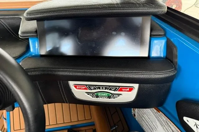 Slide: The Image of Dashboard of a 2020 Nautique Super Air Nautique G25 boat with control panel. - 9