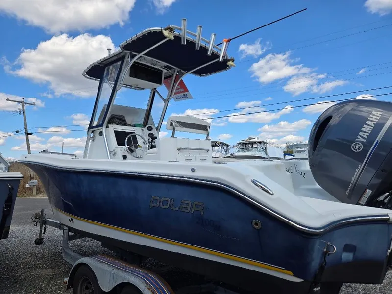Slide: The Image of 2004 Polar 2100 Center Console boat with Yamaha engine, blue sky. - 3