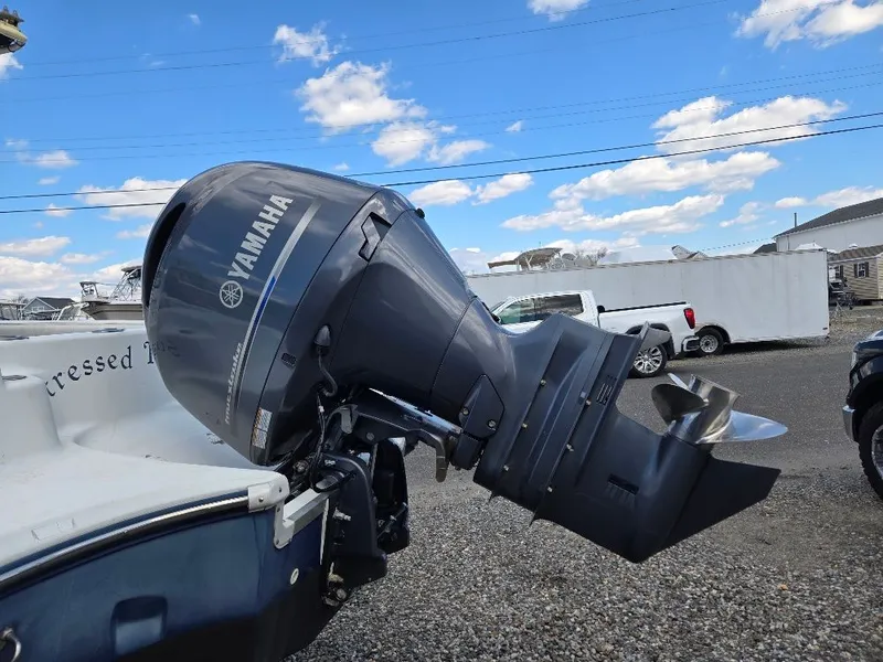 Slide: The Image of Yamaha outboard motor on a 2004 Polar 2100 CC boat. - 2