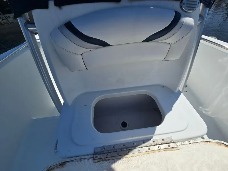 Slide: The Image of Interior view of a 2004 Polar 2100 CC boat with storage compartment. - 20