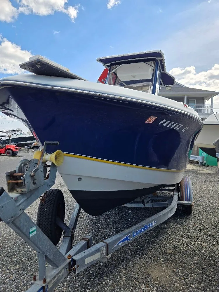 Slide: The Image of 2004 Polar 2100 CC Center Console on trailer, blue hull. - 5