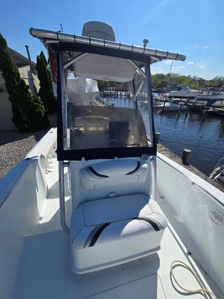 Slide: The Image of 2004 Polar 2100 CC Center Console boat at dock. - 10