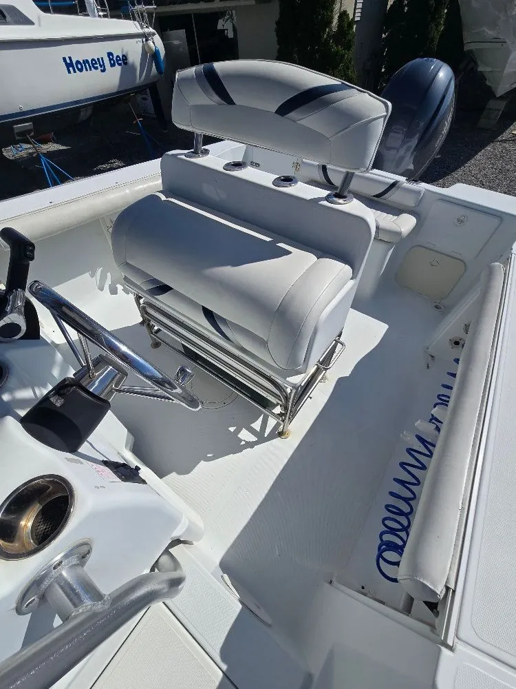 Slide: The Image of Interior view of a 2004 Polar 2100 CC Center Console boat. - 13