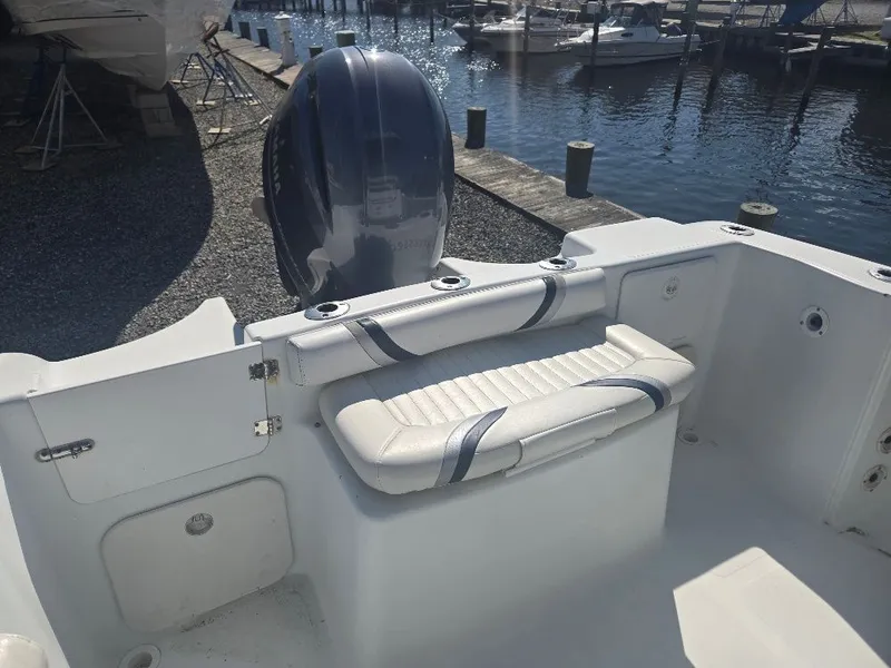 Slide: The Image of 2004 Polar 2100 CC Center Console boat at dock. - 6