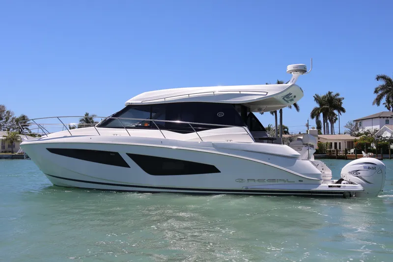 Slide: The Image of Spacious deck area of 2021 Regal 42 XO yacht with cushioned seating. - 23