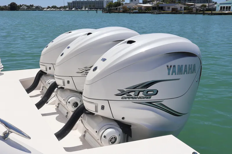 Slide: The Image of Modern kitchen area in 2021 Regal 42 XO yacht with microwave and stainless steel appliances. - 30