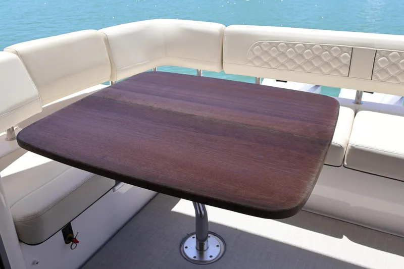 Slide: The Image of Helm of 2021 Regal 42 XO yacht with advanced navigation controls and displays. - 40