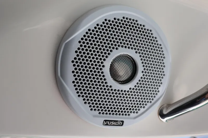 Slide: The Image of Helm of 2021 Regal 42 XO yacht with modern controls and Garmin display. - 41