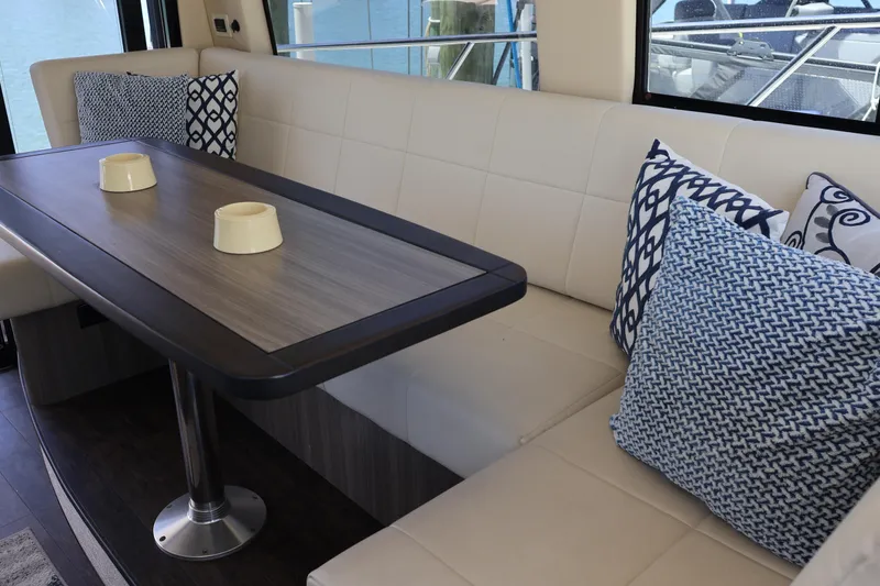 Slide: The Image of Modern kitchen interior of 2021 Regal 42 XO yacht with sleek cabinetry and stainless steel appliances. - 49