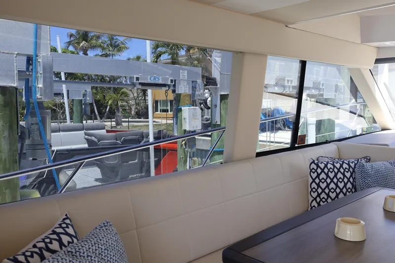 Slide: The Image of Interior cabinetry of 2021 Regal 42 XO yacht, featuring sleek wood finish and modern design. - 51