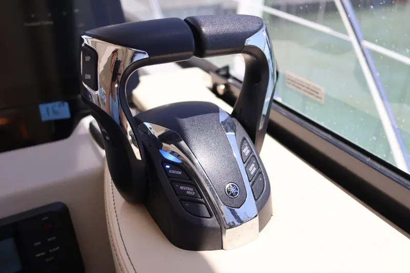 Slide: The Image of Luxurious interior of 2021 Regal 42 XO yacht with modern bedding and elegant wood finishes. - 56