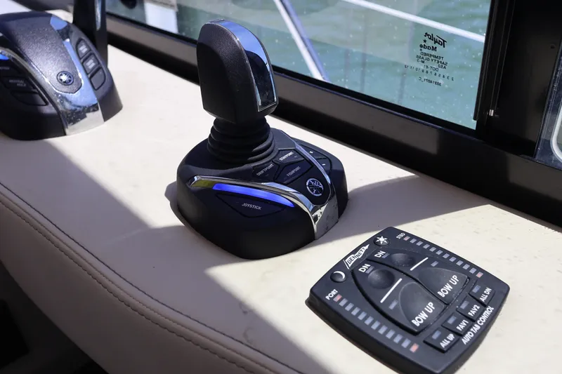 Slide: The Image of Luxurious cabin interior of 2021 Regal 42 XO yacht with modern bedding and ambient lighting. - 57