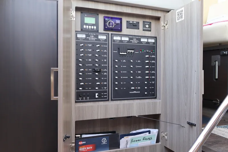 Slide: The Image of Luxurious bedroom interior of 2021 Regal 42 XO yacht with elegant bedding and ambient lighting. - 64