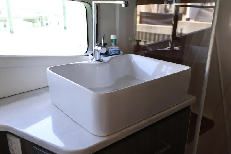 Slide: The Image of Luxurious interior of 2021 Regal 42 XO yacht with modern seating and TV. - 66