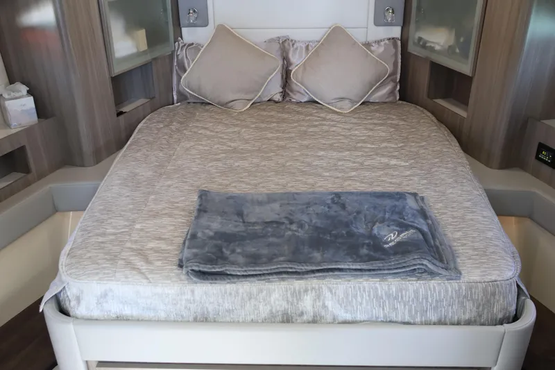 Slide: The Image of Luxurious interior of 2021 Regal 42 XO yacht with sofa, TV, and window. - 67