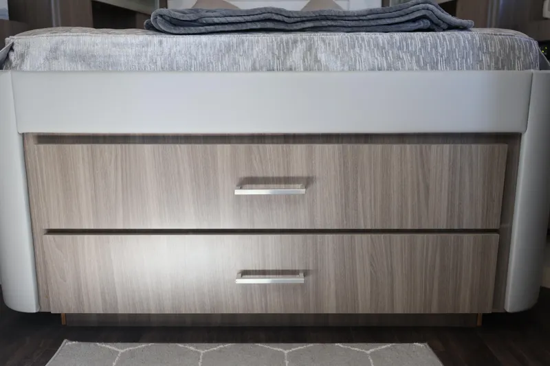 Slide: The Image of Interior of 2021 Regal 42 XO yacht with open wardrobe and TV. - 68