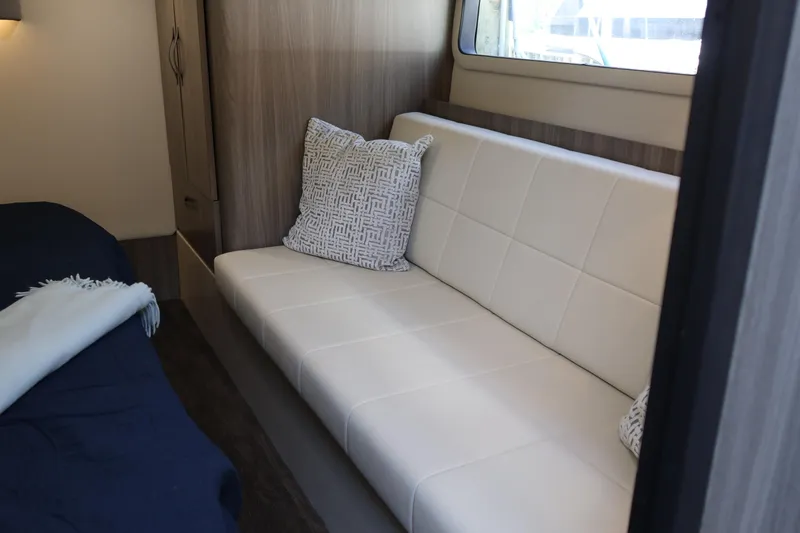 Slide: The Image of Close-up of Regal 42 XO 2021 model emblem on a boat. - 69