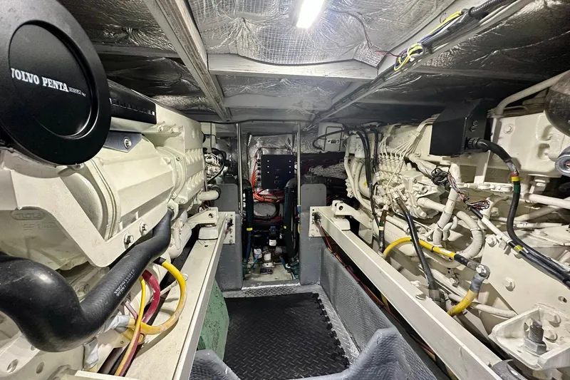 Slide: The Image of Engine room of a 2001 Silverton 42 Convertible yacht with Volvo Penta engines. - 14