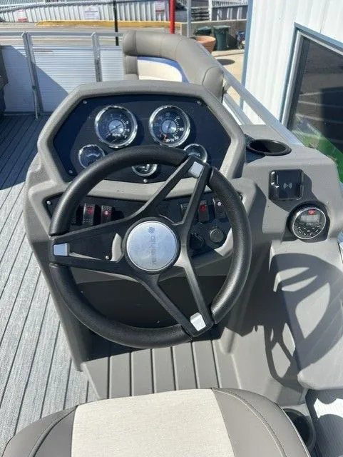 Slide: The Image of Armada Saphir 23CR Tritoon steering console, 2025 model. - 10
