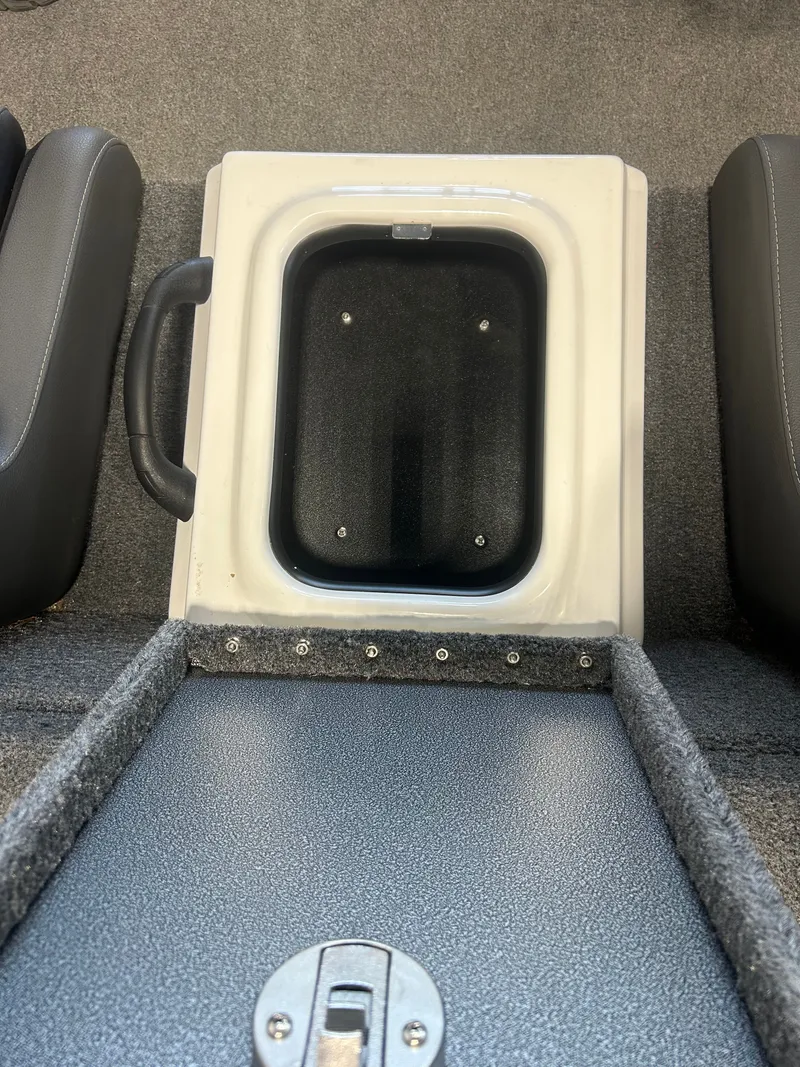 Slide: The Image of Interior of Falcon F215 boat with storage compartment. - 12