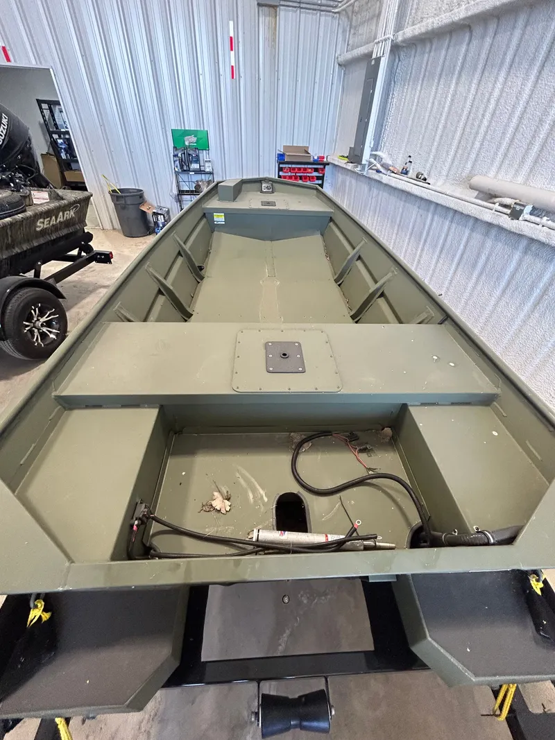 Slide: The Image of SeaArk 1448MV fishing boat with trailer, interior view, 2026 model. - 10