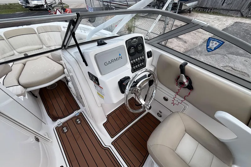 Slide: The Image of 2019 Sea Fox 226 Traveler boat cockpit with Garmin navigation and comfortable seating. - 27