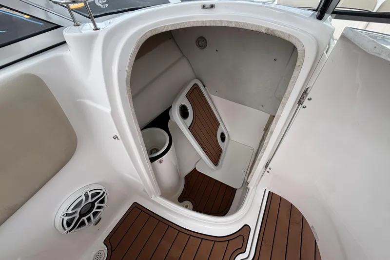 Slide: The Image of 2019 Sea Fox 226 Traveler boat interior with wood flooring and storage compartment. - 32