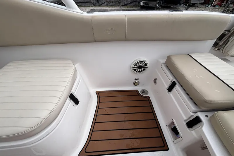 Slide: The Image of Interior seating of 2019 Sea Fox 226 Traveler boat with cushioned seats and teak-style flooring. - 37