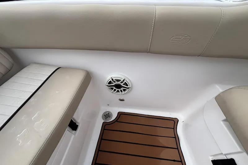 Slide: The Image of Interior of 2019 Sea Fox 226 Traveler boat with cushioned seating and speaker. - 38
