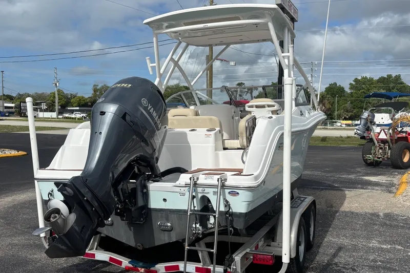 Slide: The Image of 2019 Sea Fox 226 Traveler boat with Yamaha engine on trailer, parked outdoors. - 4