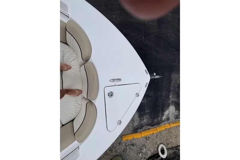 Slide: The Image of 2019 Sea Fox 226 Traveler boat bow with cushioned seating and anchor locker. - 45