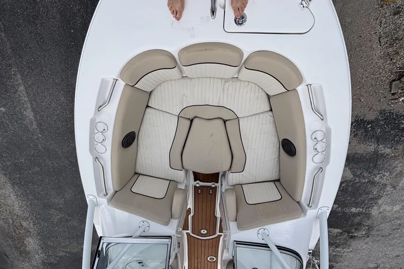 Slide: The Image of 2019 Sea Fox 226 Traveler boat interior with cushioned seating and cup holders. - 47