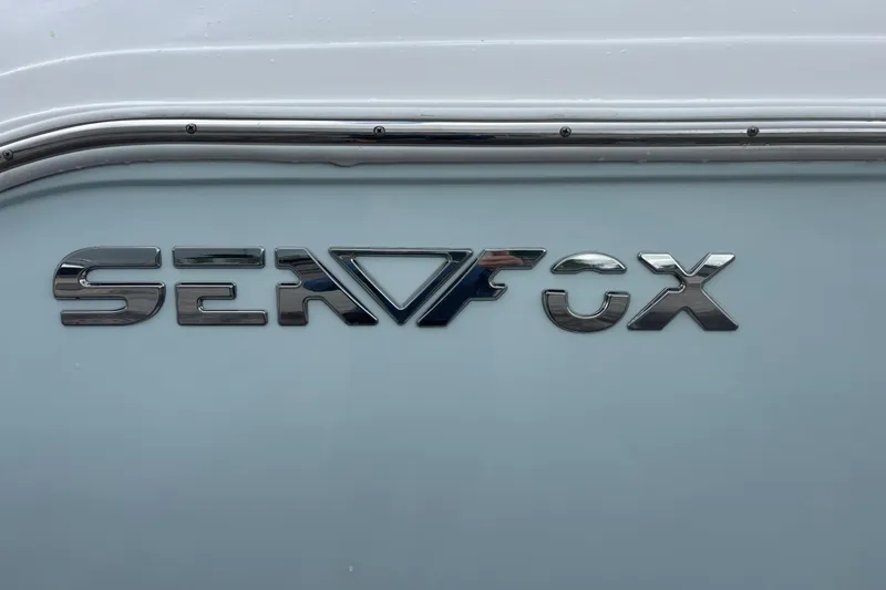 Slide: The Image of Chrome "Sea Fox" logo on 2019 Sea Fox 226 Traveler boat. - 49